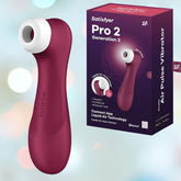 The image showcases the Satisfyer Pro 2 Generation 3 With App air pulse vibrator in burgundy. On the left is the device, while its box on the right highlights features like "Bluetooth App," "Liquid Air Technology," and "3 Functions" against a blurred pastel background.